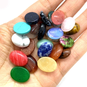 Variety of polished oval tiger eye and agate gemstones for DIY jewelry ring making