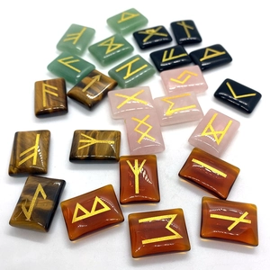 Nordic Rune stones set with engraved gold symbols in mixed natural gemstones and tiger eye