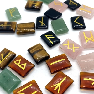 Elder Futhark rune stones set in tiger eye and rose quartz with gold engravings