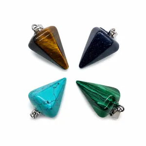Macro detail of faceted gemstone cone pendants with polished silver metal bails