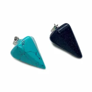 Detail view of conical turquoise and blue sandstone pendants with silver metal clasps