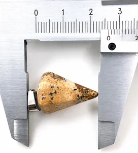 Macro view measuring a 23mm cone shaped natural stone pendant with silver clasp for DIY