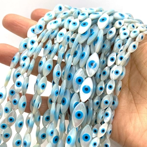 Marquise shell evil eye beads with blue iris and iridescent luster for DIY jewelry making
