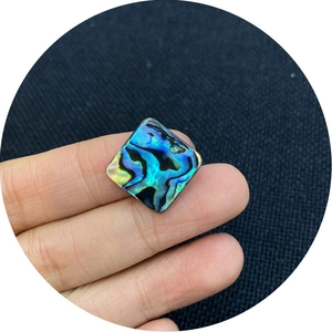 Natural square abalone shell bead with iridescent blue green and purple luster textures