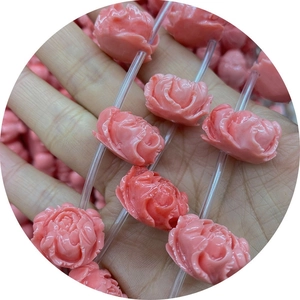 Pink synthetic coral flower beads with detailed petal carving for DIY jewelry making