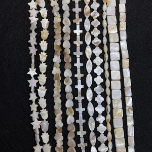 Assorted natural freshwater mother of pearl shell beads in multiple geometric shapes
