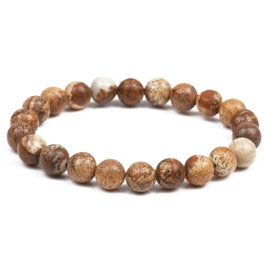 Macro shot of natural brown volcanic lava stone beads showing detailed earthy textures