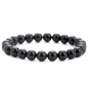Polished black lava stone beaded bracelet for men and women with a minimalist style