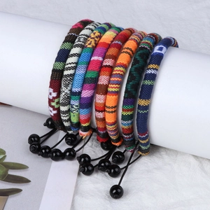 Handmade Bohemian woven friendship bracelets set with colorful patterns and adjustable beads