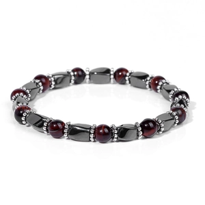 Detailed macro of red tiger eye beads and hematite stones on a high-quality elastic bracelet