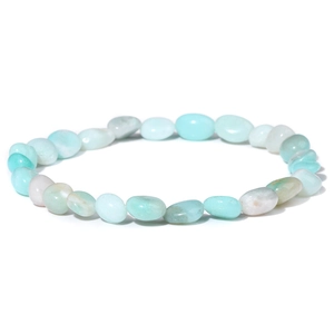Detailed macro shot of natural irregular light blue amazonite stone elastic bracelet