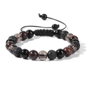 Detalle de pulsera trenzada ajustable con cuarzo ahumado, obsidiana y piedras de lava