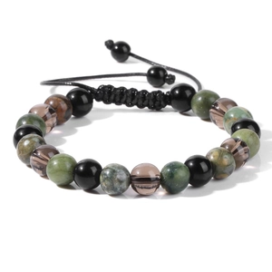 Detalle de la pulsera de piedras con cuarzo ahumado y cordón negro trenzado ajustable