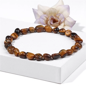 Natural tiger eye stone stretch bracelet featuring irregular brown and gold beads