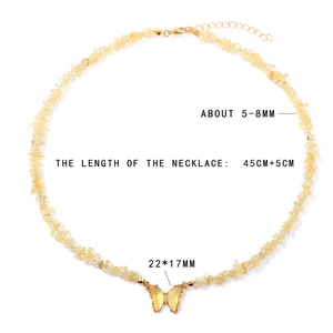 Women's yellow natural stone chip necklace with gold butterfly pendant and 45cm extension chain