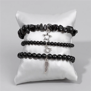 Three-piece set of black stone beaded stretch bracelets with star and feather silver charms