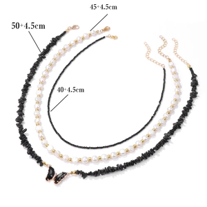 Three-layer vintage necklace set with natural stone beads, pearls, and black butterfly pendant