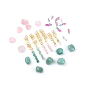 Detail of colorful natural stone spiral hair rings in gold plating for dreadlock styling
