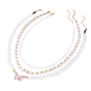 Three-layer beaded necklace featuring natural stones, pearls, and a pink butterfly pendant