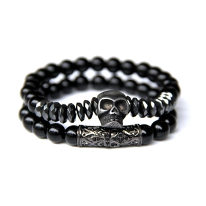 Two-piece set of natural black stone bead bracelets with silver skull charm for men