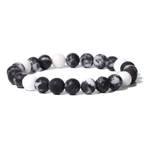 Natural 8mm stone bead bracelet with black matte and white marble beads on elastic cord