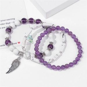 Set di tre braccialetti di perline con turchese bianco, ametista e ciondolo ad ala