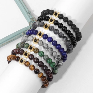 Bracciali da uomo in pietre naturali con chiusura a ferro di cavallo dorata vari