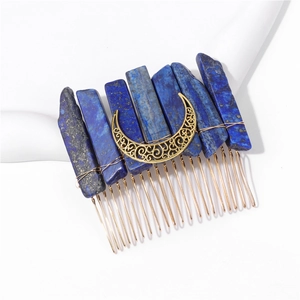 Detail of bohemian gold hair comb with raw lapis lazuli stones and moon charm
