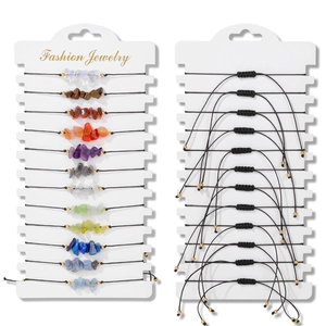 Detail view of 12pcs adjustable braided stone bracelets on white display cards