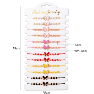 Set of 12 colorful beaded bracelets with butterfly pendants on display card