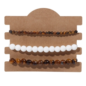 Three-piece beaded bracelet set featuring tiger eye stones and a tree of life charm