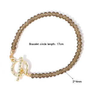 Bracelet en pierres brunes facettées pour femme avec fermoir à bascule doré chic