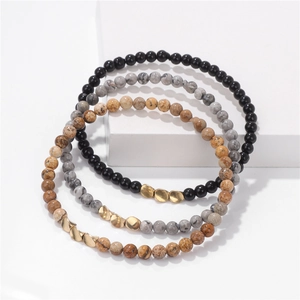 Three-piece set of 4mm natural stone beaded bracelets with black, marble, and jasper beads