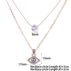 Rose gold layered necklace set with blue Evil Eye pendant and colorful crystal teardrop