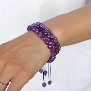 Three-piece set of purple amethyst beaded bracelets with adjustable braided cords
