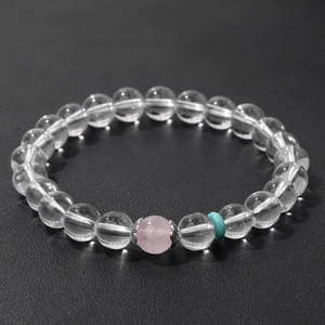 Pulsera minimalista de cuarzo transparente y rosa con espaciador de turquesa azul