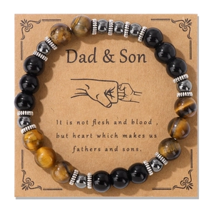 Detail of beaded bracelet with tiger eye and hematite stones on a Father and Son gift card