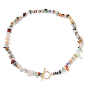 Detailed macro view of vintage multi-color natural stone necklace with gold OT toggle clasp