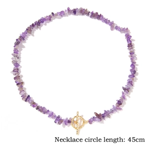 Detail of 45cm natural amethyst beaded necklace with a textured golden OT toggle clasp