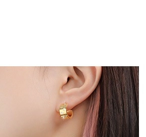 Detail of 18K gold plated hoop earrings featuring sparkling white zircon stones for women