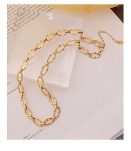 Detail of 18K gold-plated twisted oval link chain necklace with adjustable extension