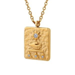 Ancient Egyptian sun pendant necklace in 18K gold plated steel with cubic zirconia
