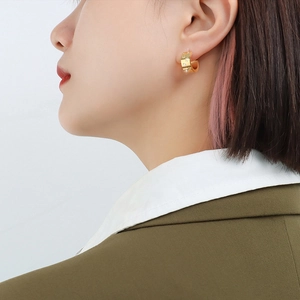 Chic 18K gold plated C-shaped geometric hoop earrings with zircon stones on model