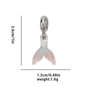 Macro view of silver fish tail charm showing pink enamel detail and dimensions