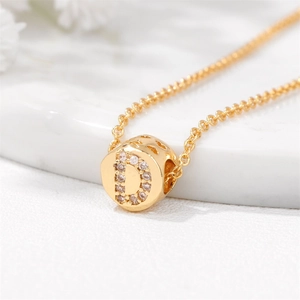 Golden chain necklace with letter D pendant inlaid with white zircon and side heart cutout