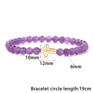 6mm purple stone bead bracelet with a gold metal cross charm on a white background