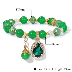 Green crystal beaded bracelet with water drop pendant and gold leaf detail, 19cm length