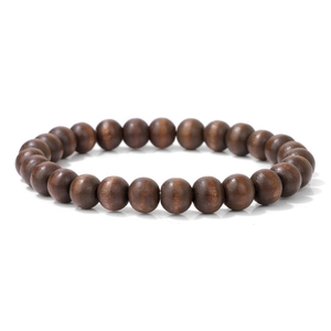 Bracciale unisex in perline di legno marrone scuro fatto a mano con texture naturale