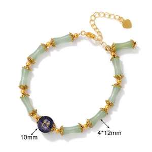 Bamboo-shaped jade beaded bracelet with golden Taurus charm and heart pendant extension