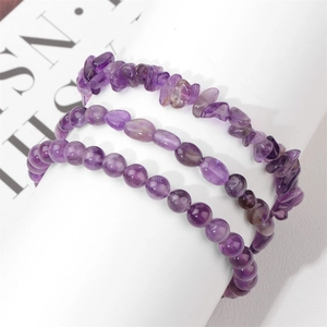 Three-piece set of natural purple amethyst bracelets with irregular, oval, and round beads